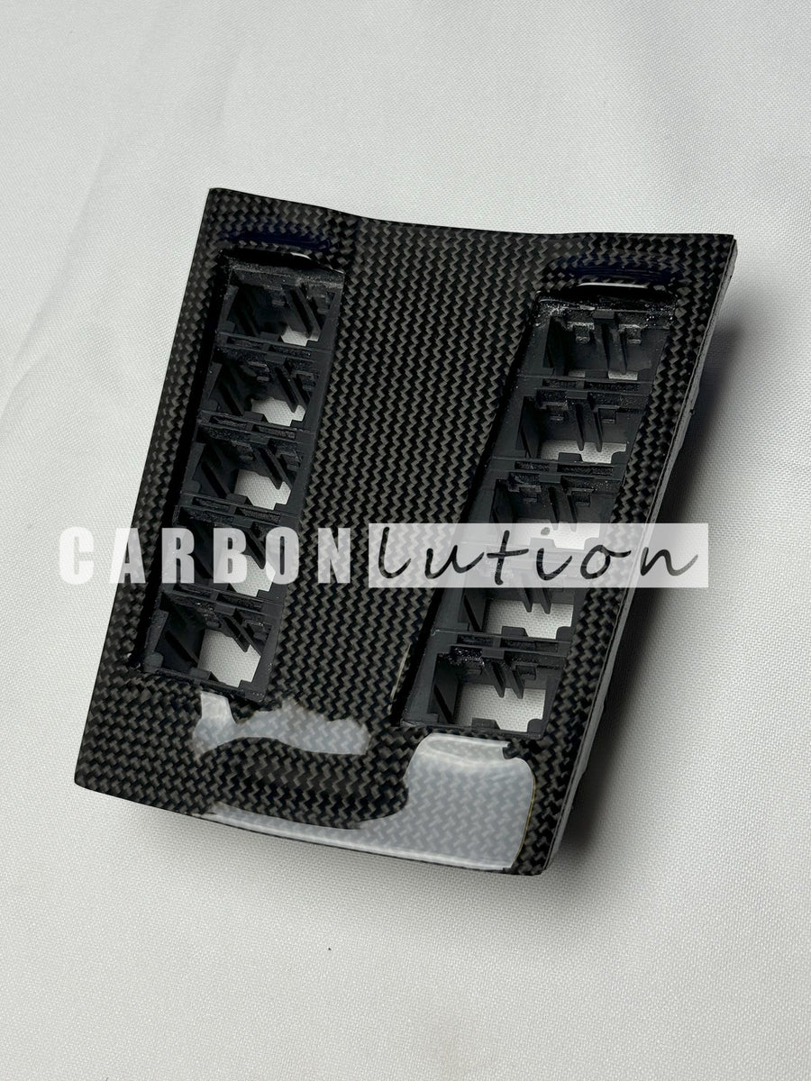 Carbon center console switch surround