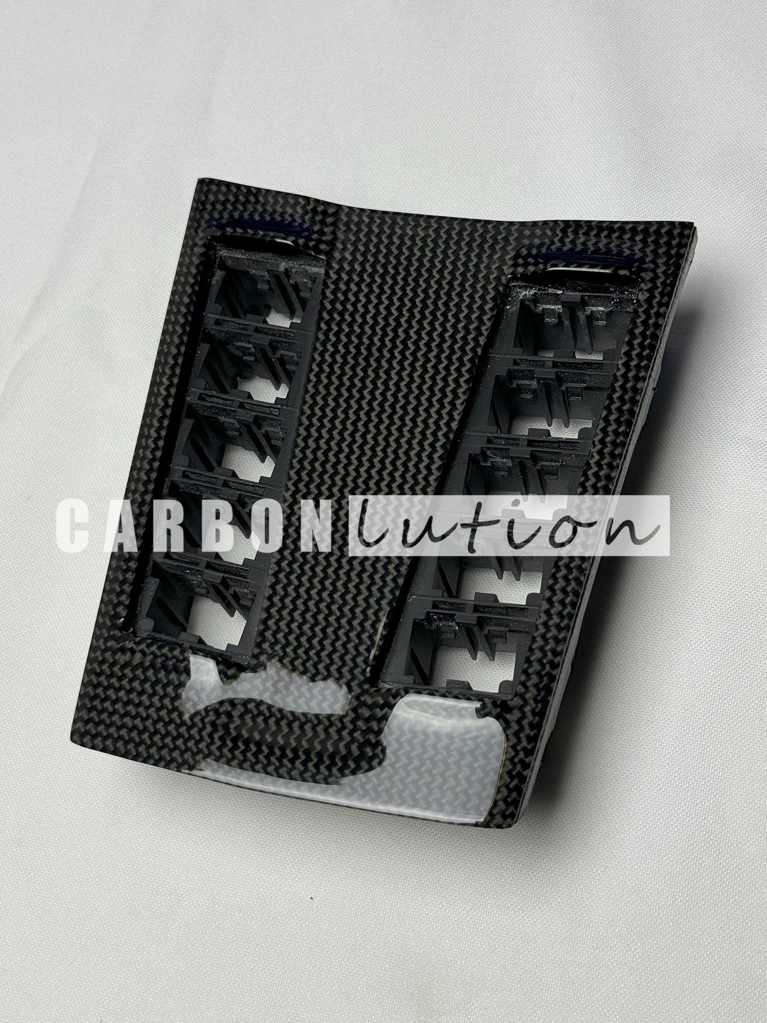 Carbon center console switch surround