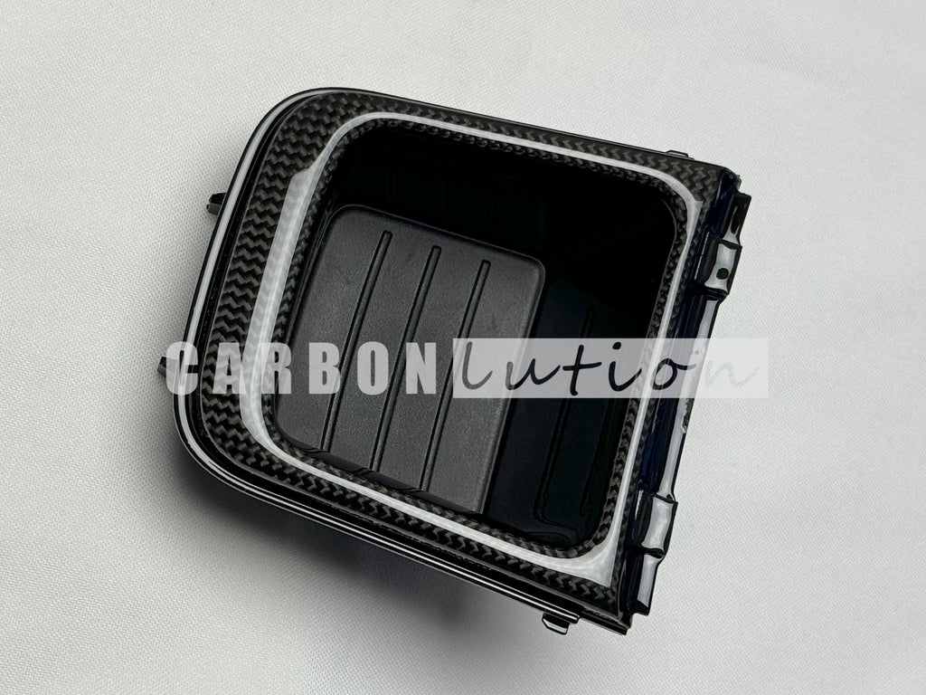 Carbon center console coin tray