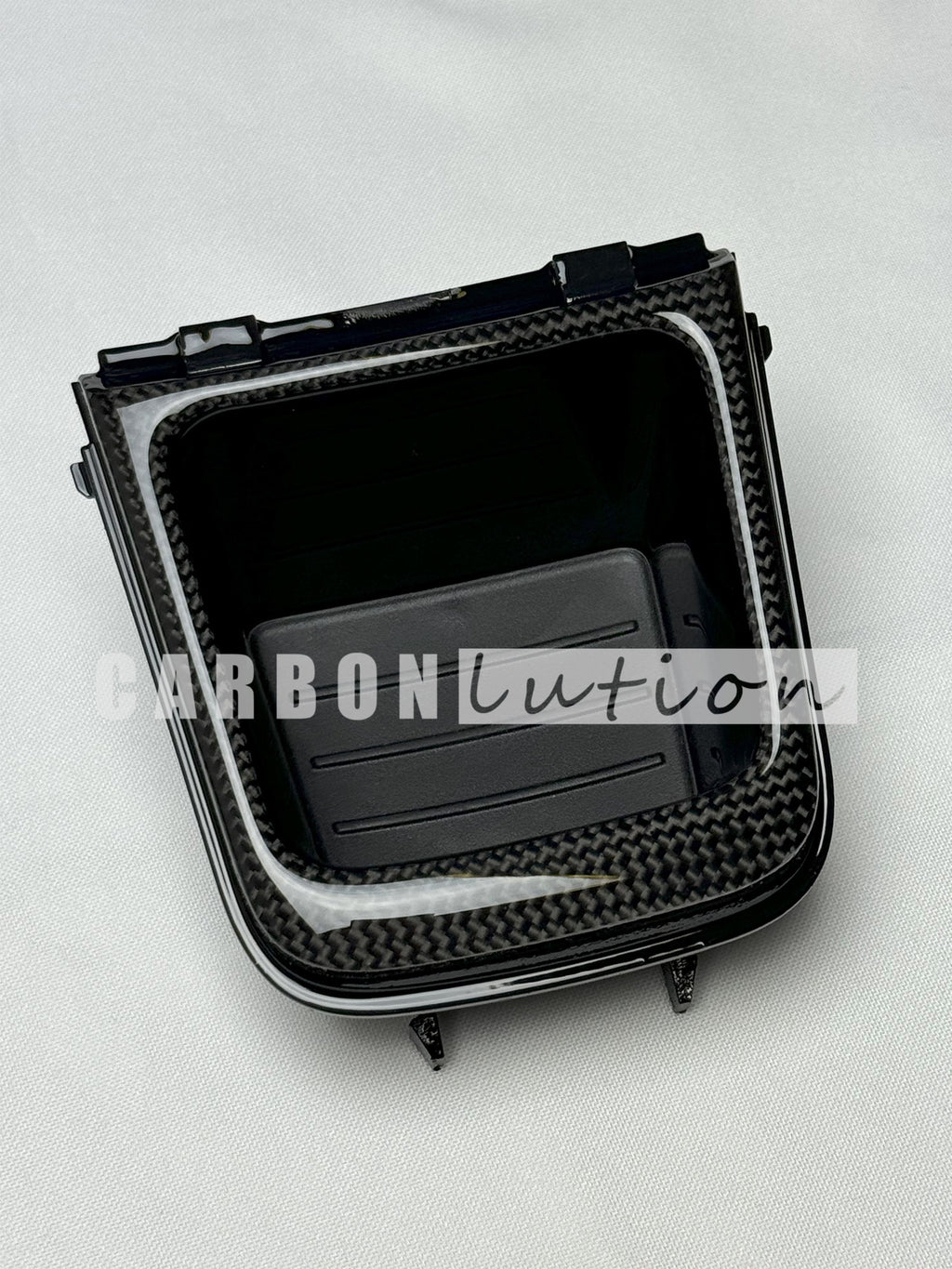 Carbon center console coin tray