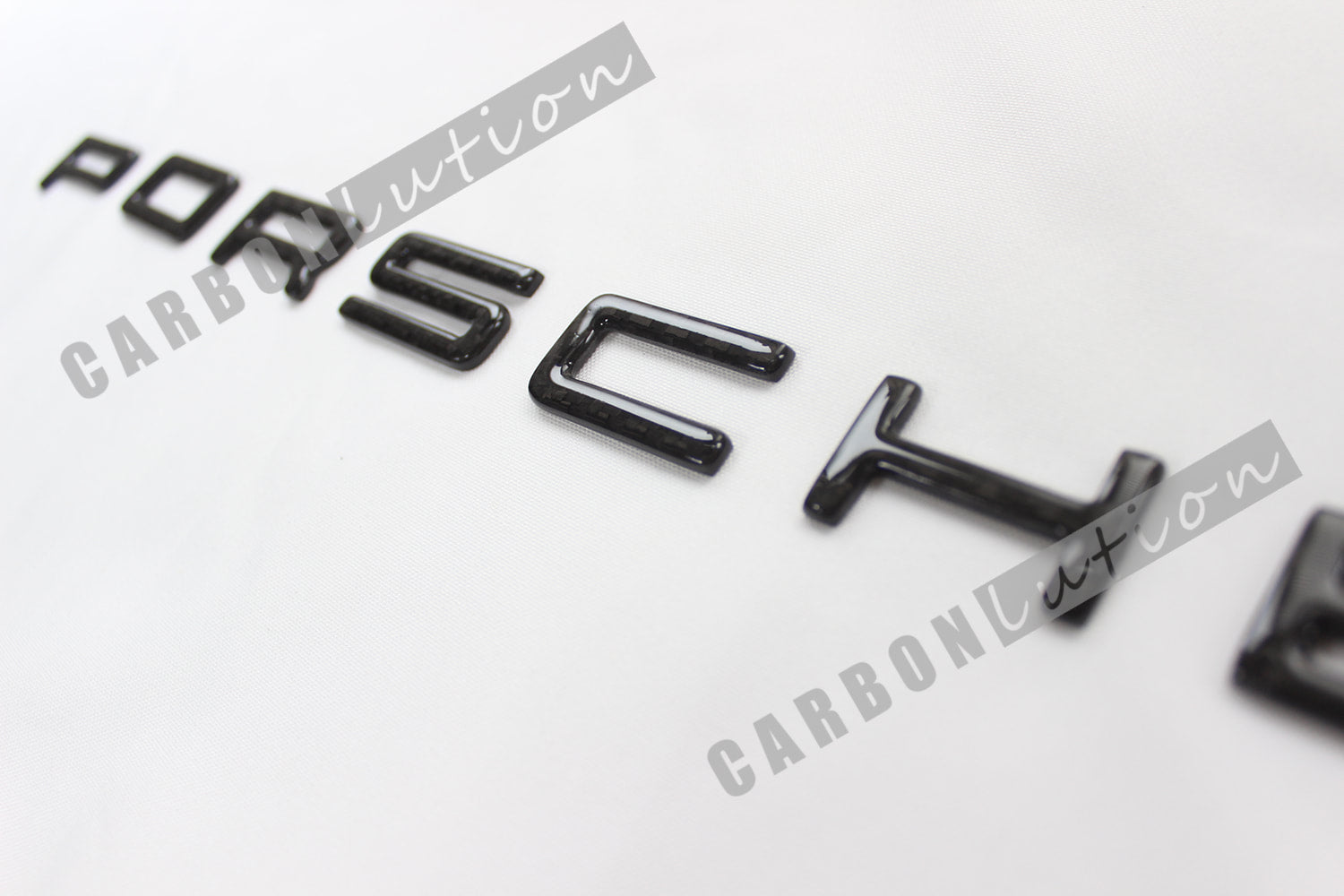 Carbon badges 986
