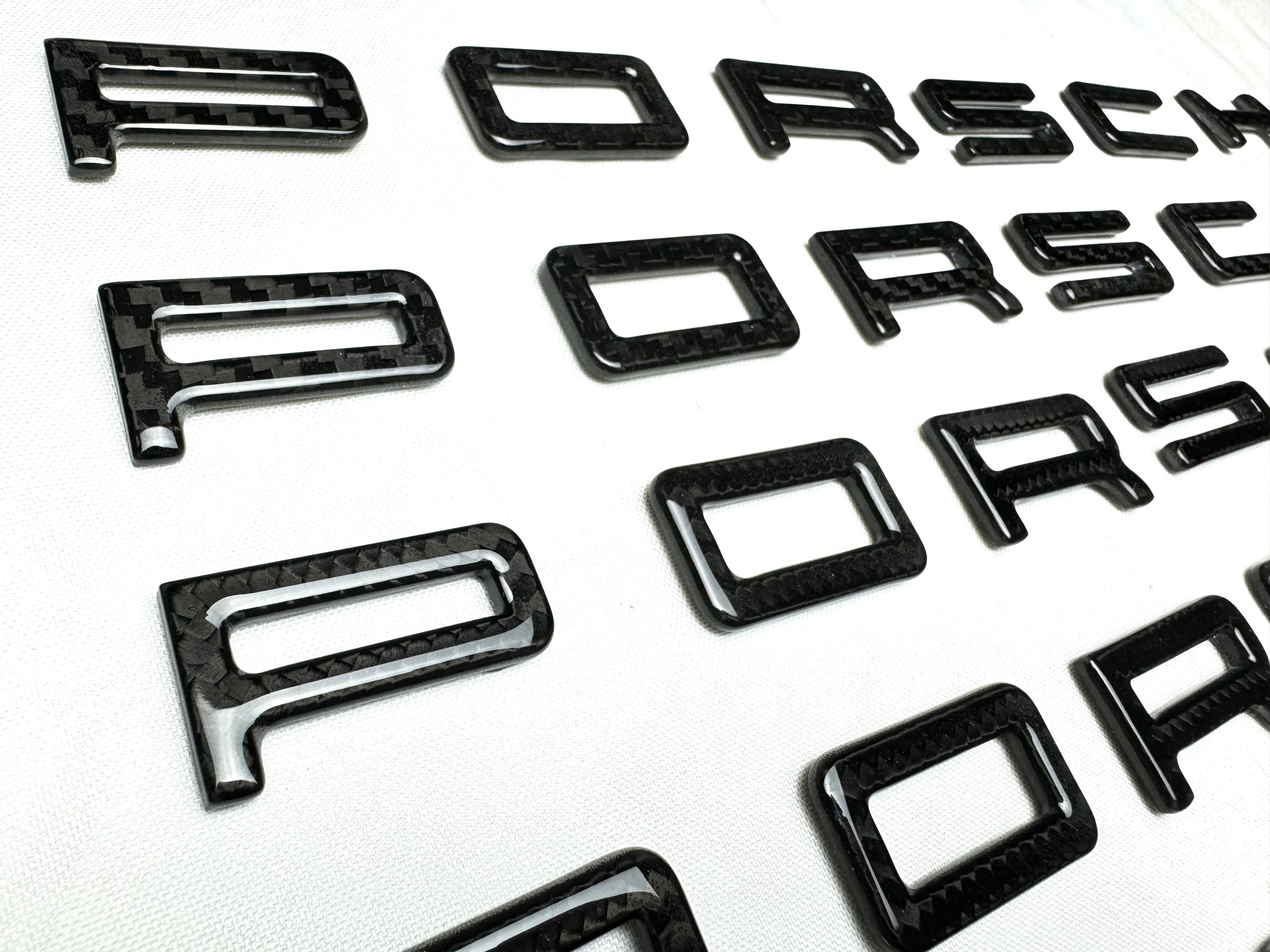 Carbon badges 997