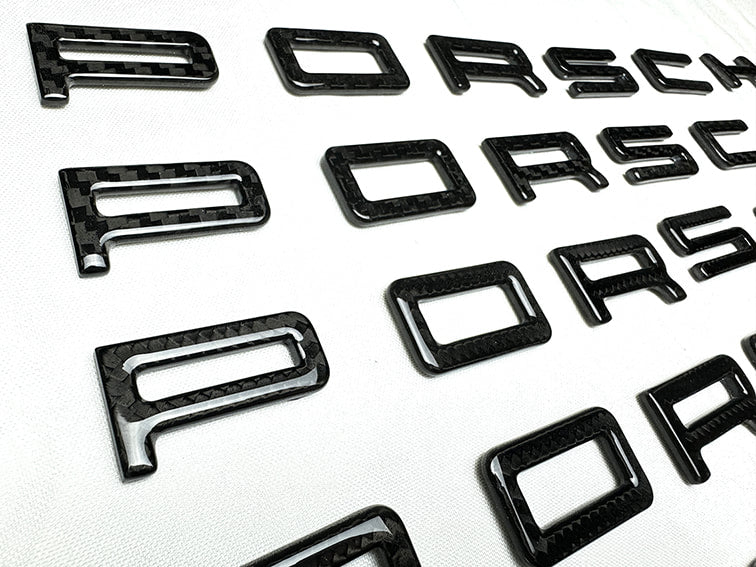 Carbon badges 981