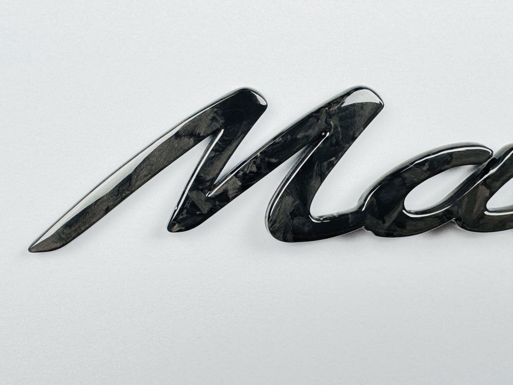 "Macan" Carbon badge