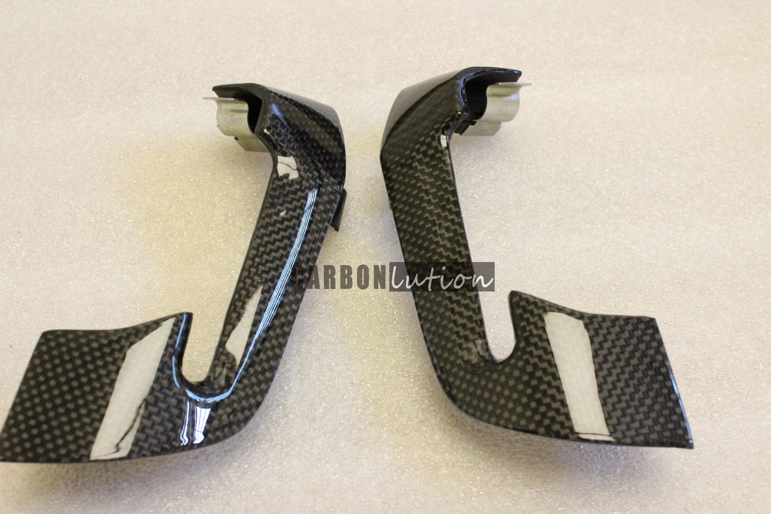 Carbon fiber seat belt trim