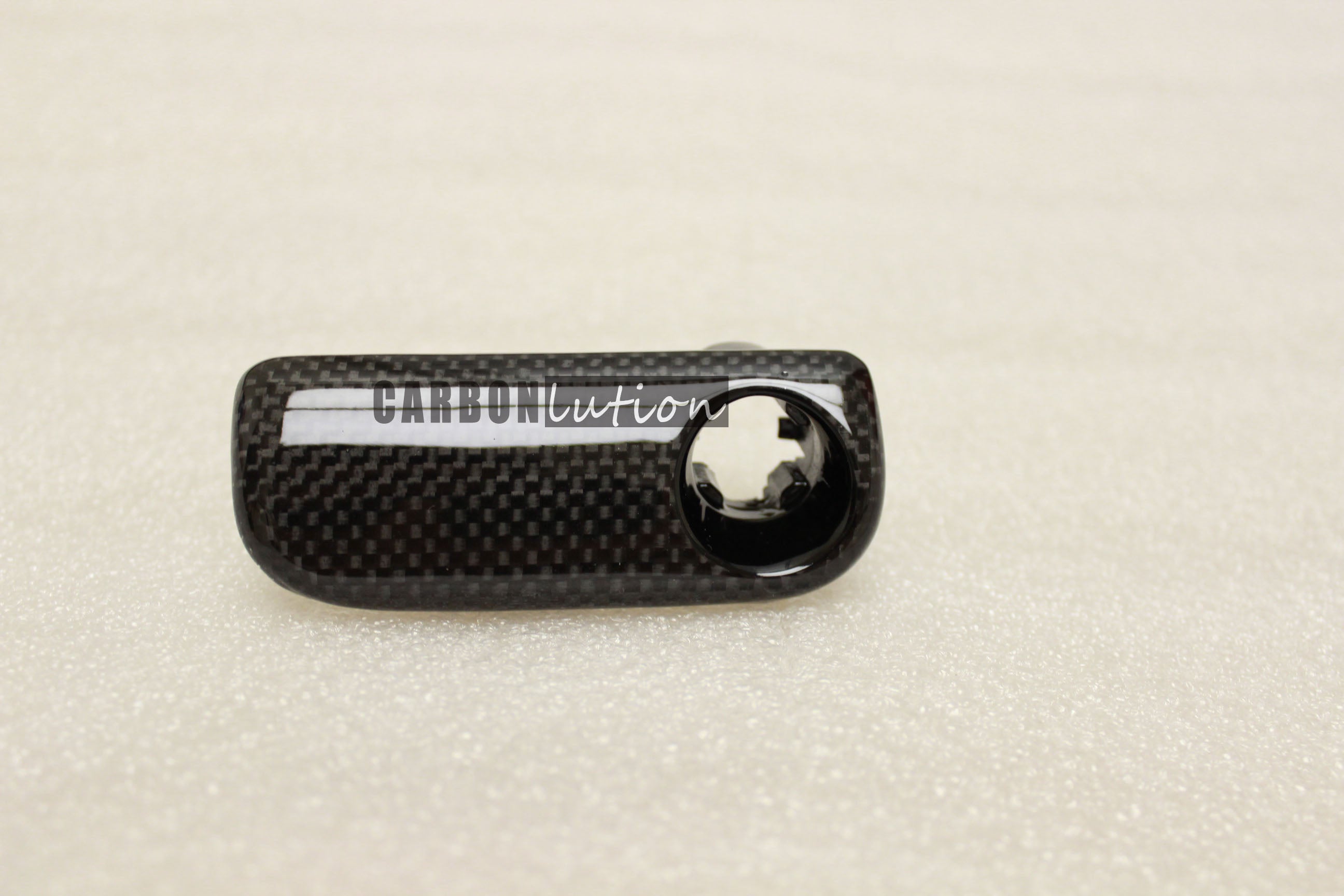 Carbon fiber glove box handle